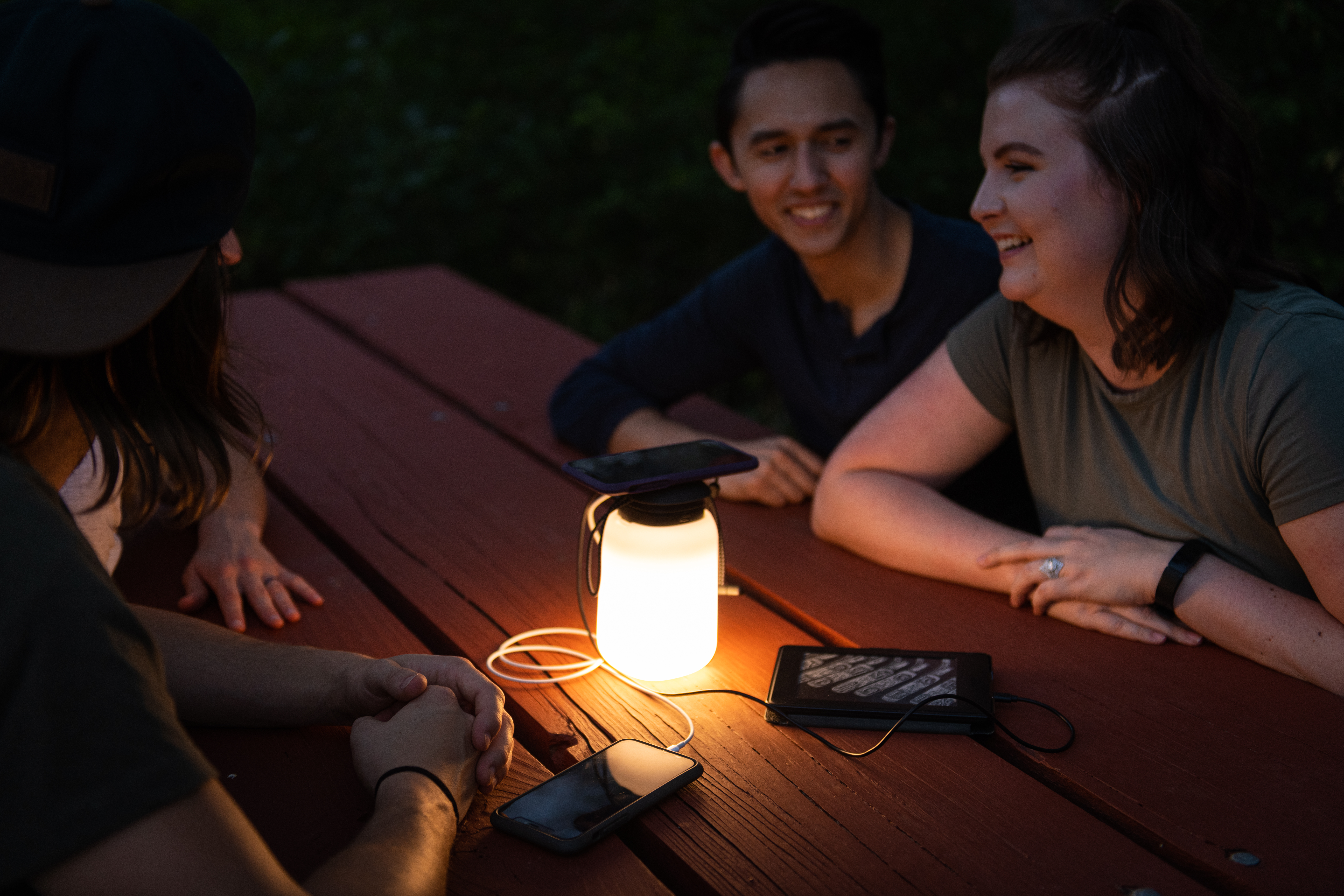 Boulder lantern and power bank shining light and charging phones