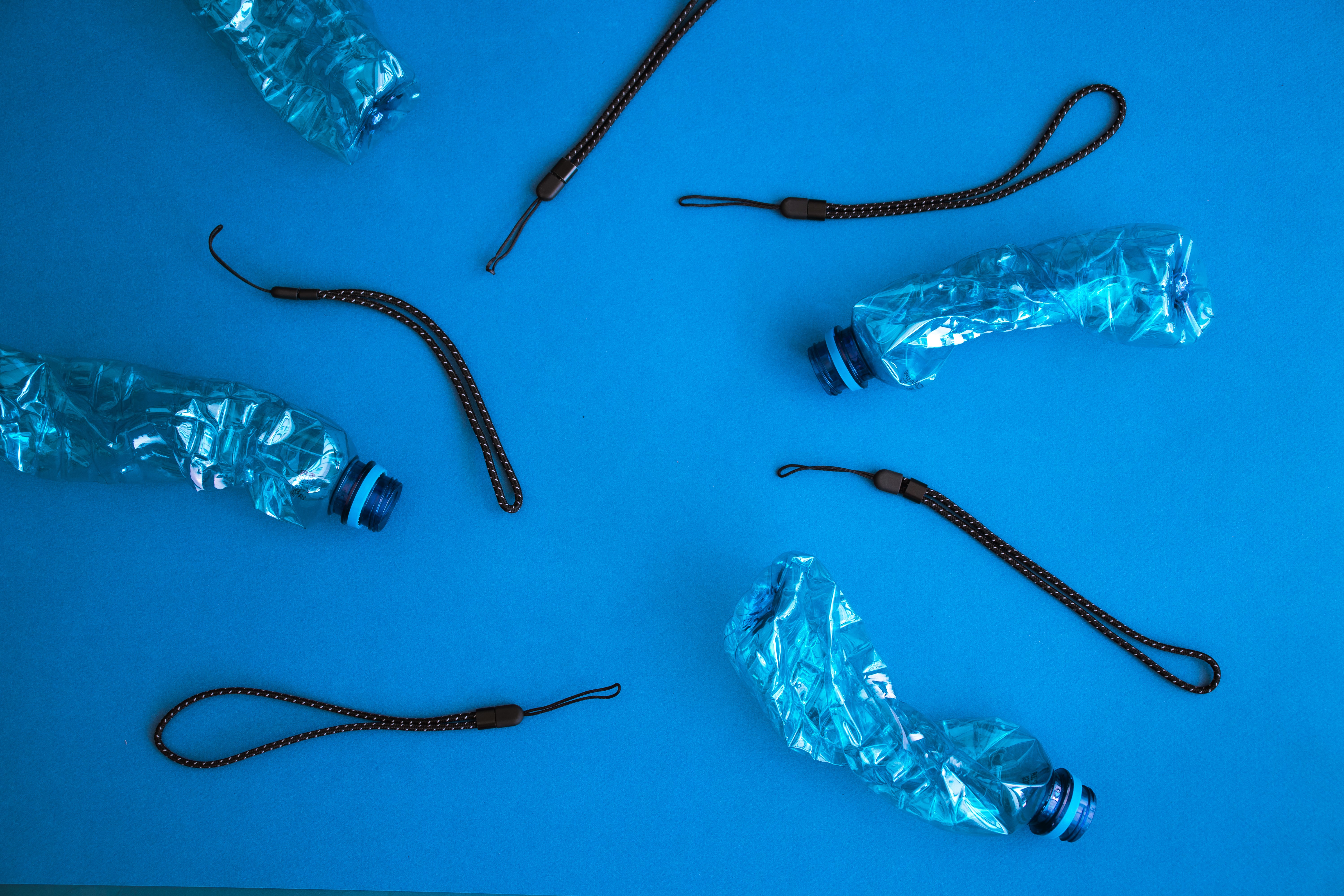 Wrist lanyards made from ocean-reclaimed plastic bottles